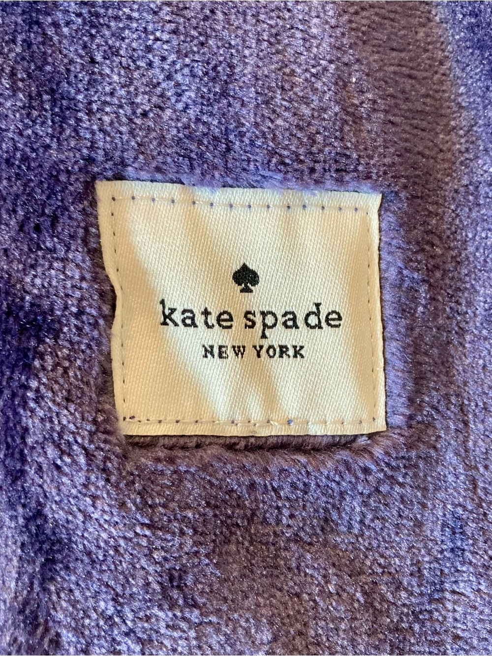 NWOT Kate Spade New York plush blanket in dark navy blue
